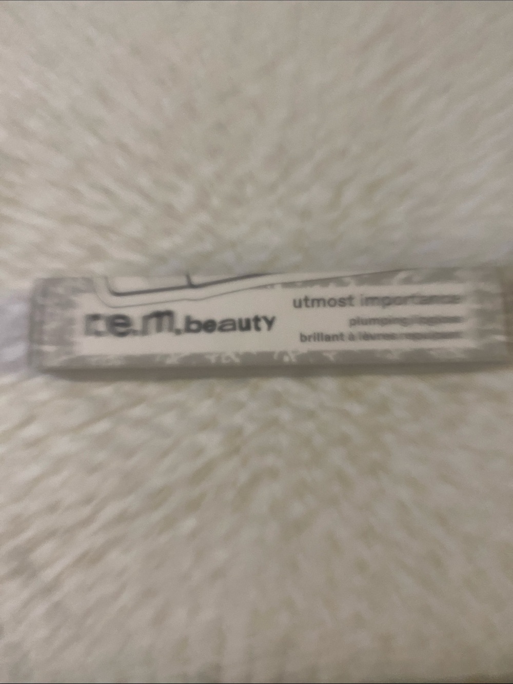 r.e.m. beauty Utmost Importance Lip Gloss - Clear Shimmer